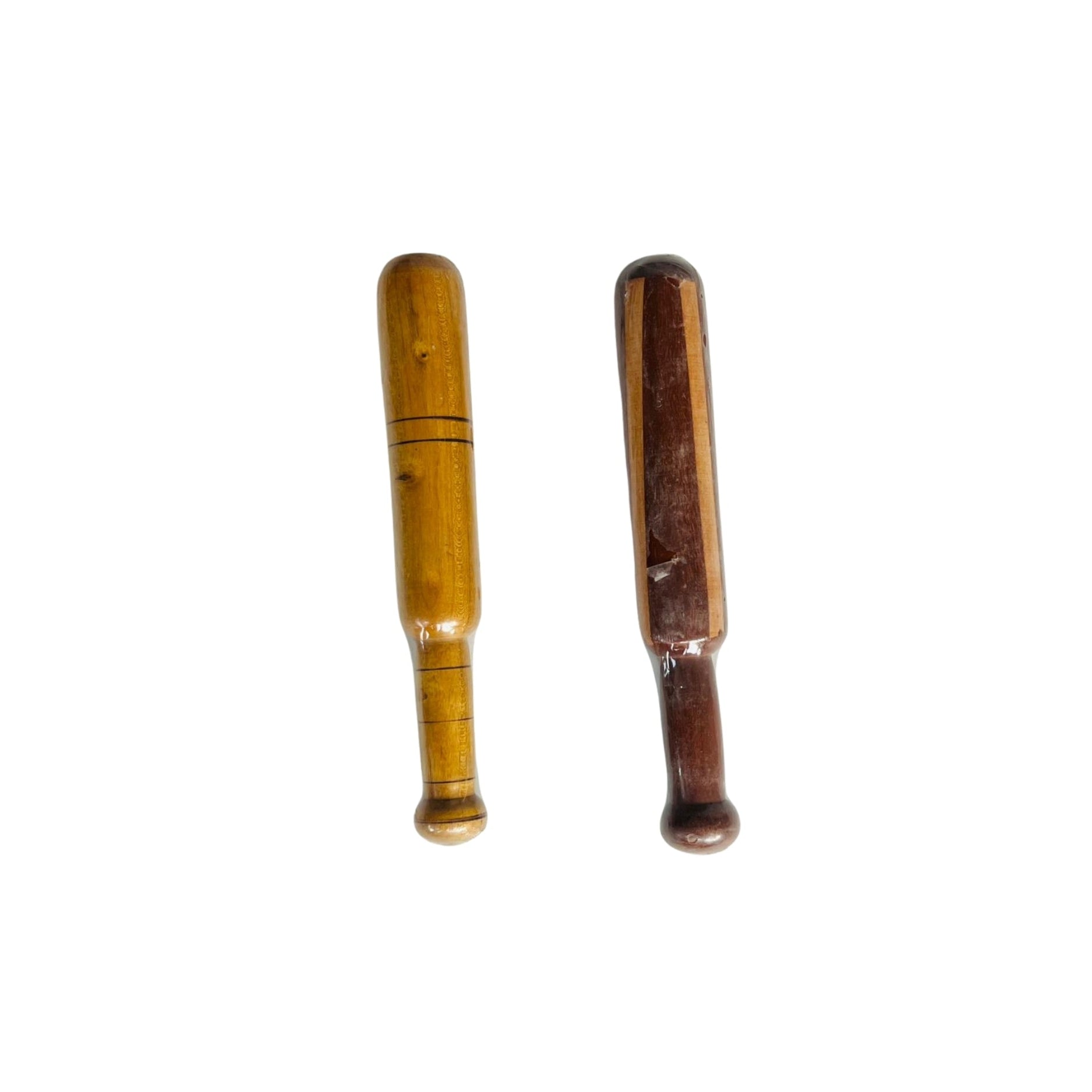 Two wooden objects on a white background