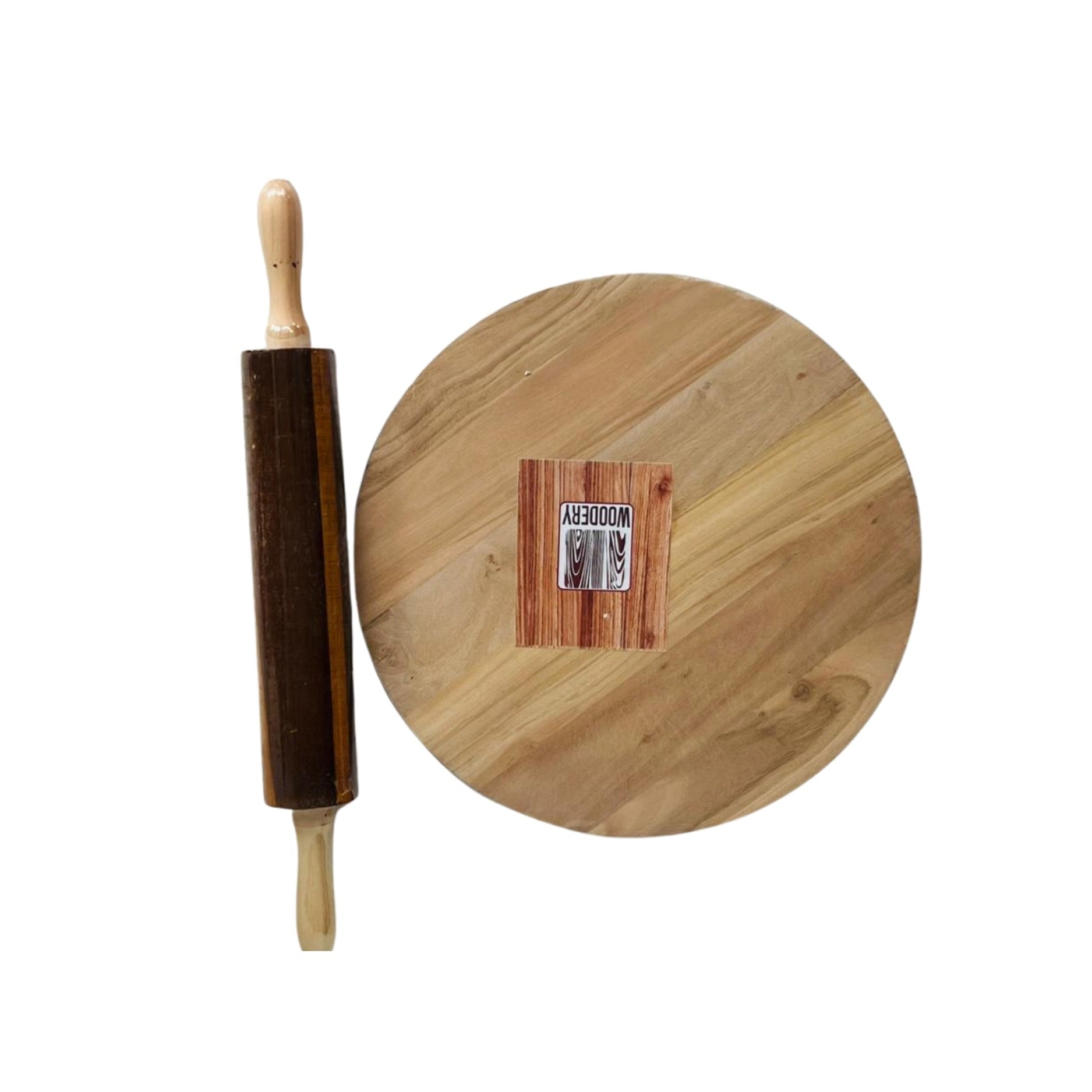 Wooden rolling pin and round wooden board on a white background