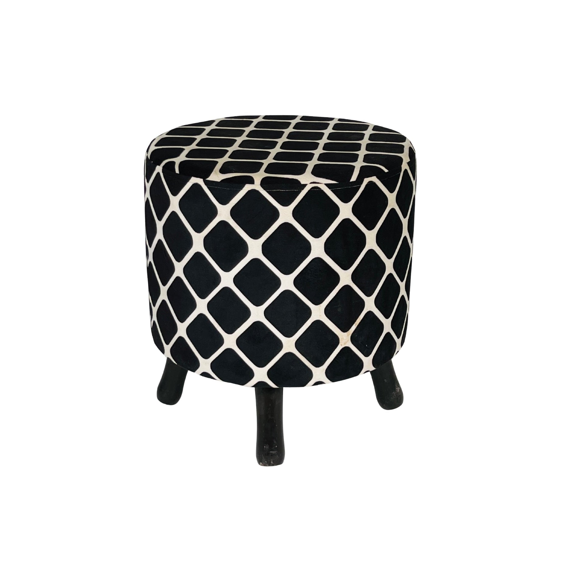 Black and white patterned ottoman on a white background