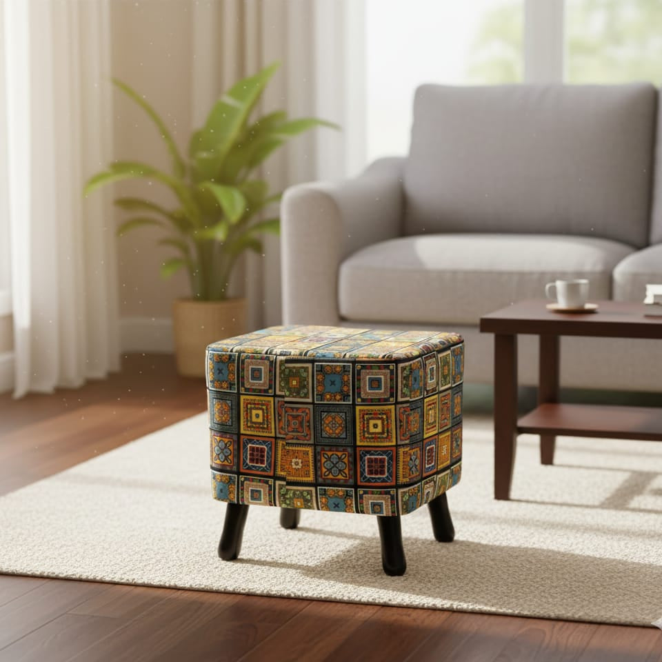 Patterned ottoman in a living room setting with a sofa and coffee table.