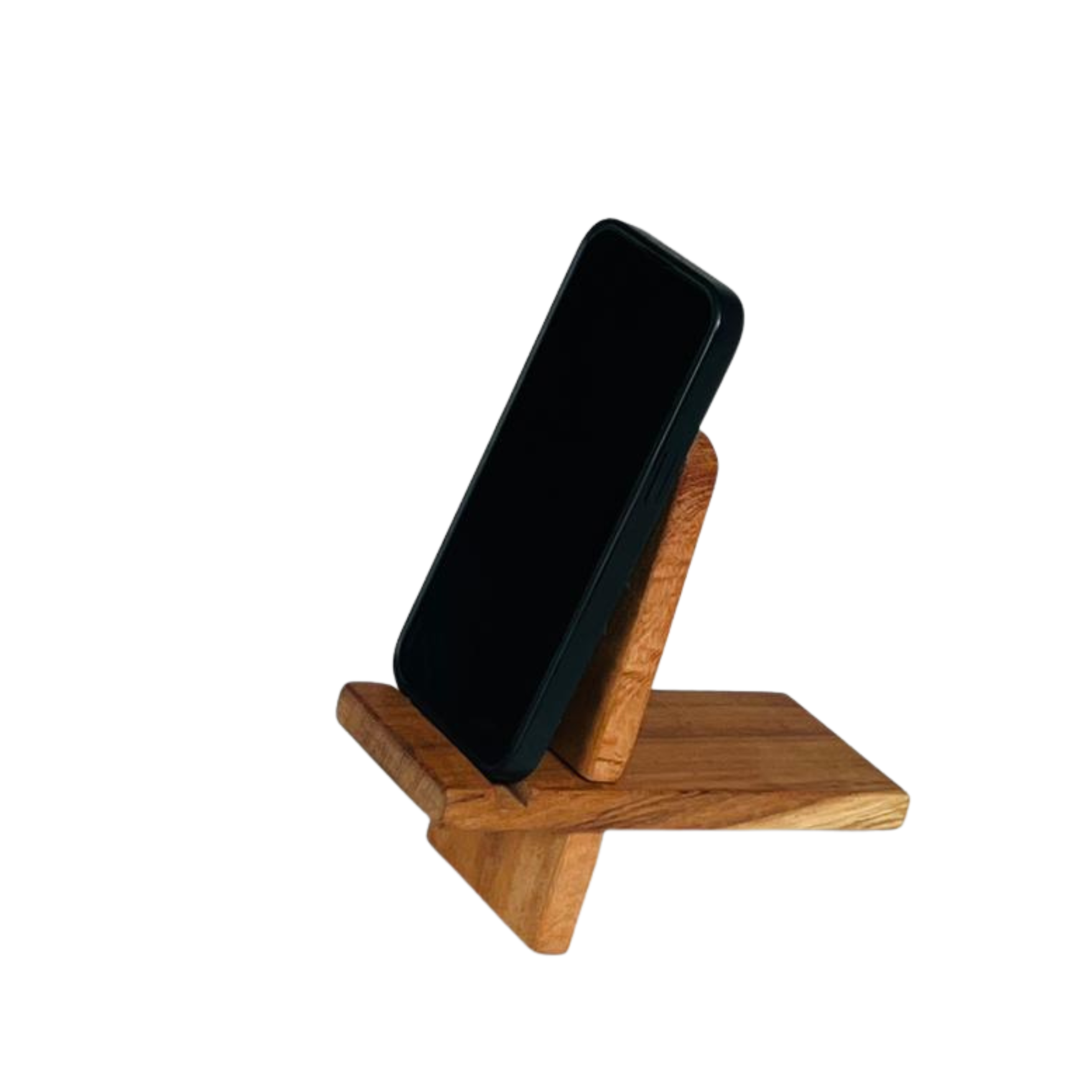 Wooden phone stand holding a black smartphone on a white background