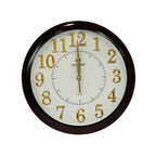 Round wall clock with gold numbers and a dark brown frame on a white background