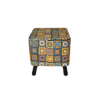 Patterned ottoman with black legs on a white background