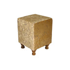Square ottoman with textured beige cover on a white background
