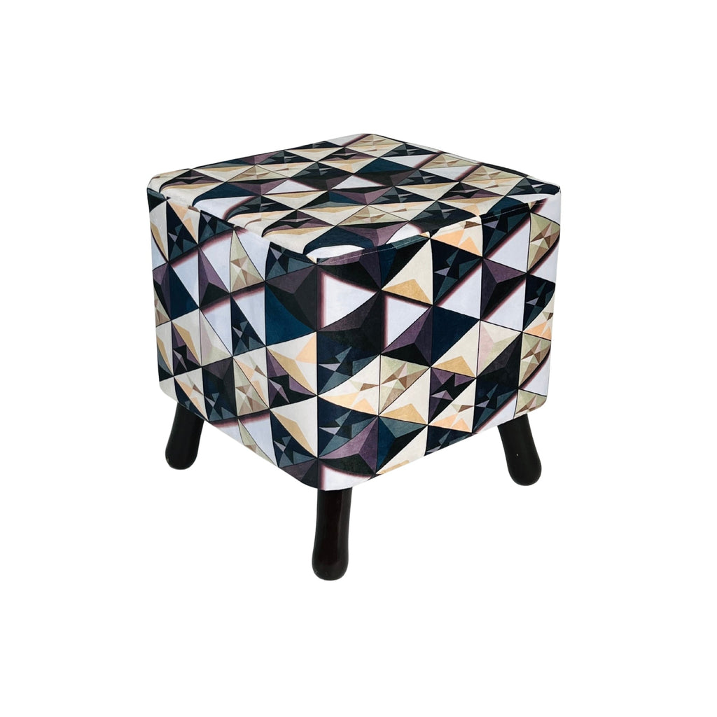 Cube-shaped ottoman with geometric pattern on a white background