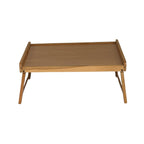 Wooden tray table with a woven top on a white background