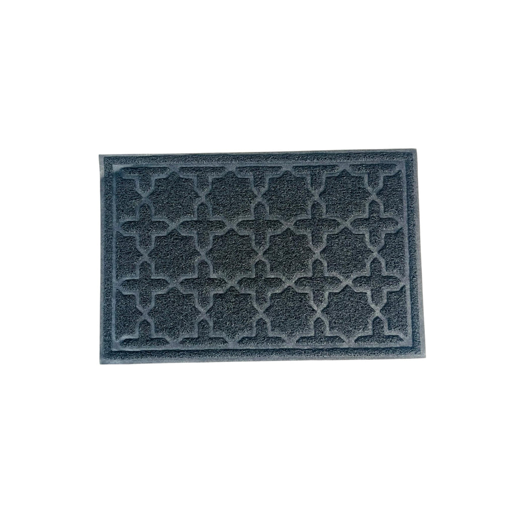 Rectangular doormat with a textured pattern on a white background