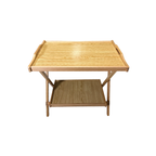 Wooden table with a tray on top on a white background