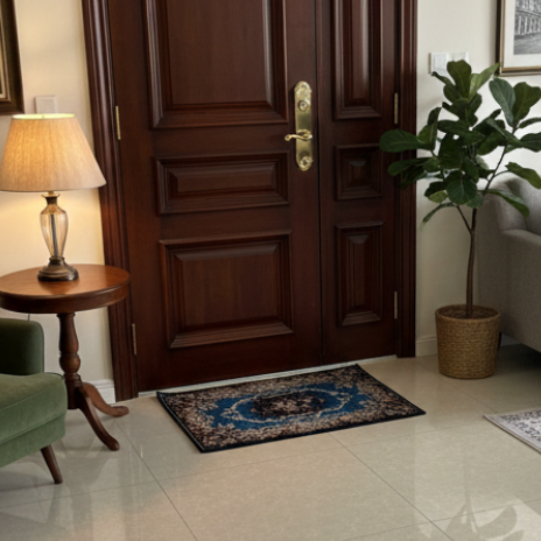 Living room with tiled floor, wooden door, and furniture.