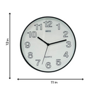 Wall clock with dimensions labeled on a white background