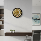 Decorative wall clock on a modern office wall with a chair and shelf in the background.